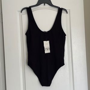 Brand new body suit, never worn , great quality